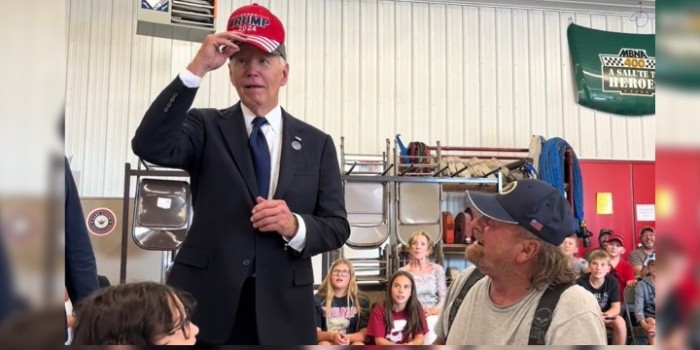 Biden Puts on MAGA Hat Just a Day After Trump’s Debate Jab